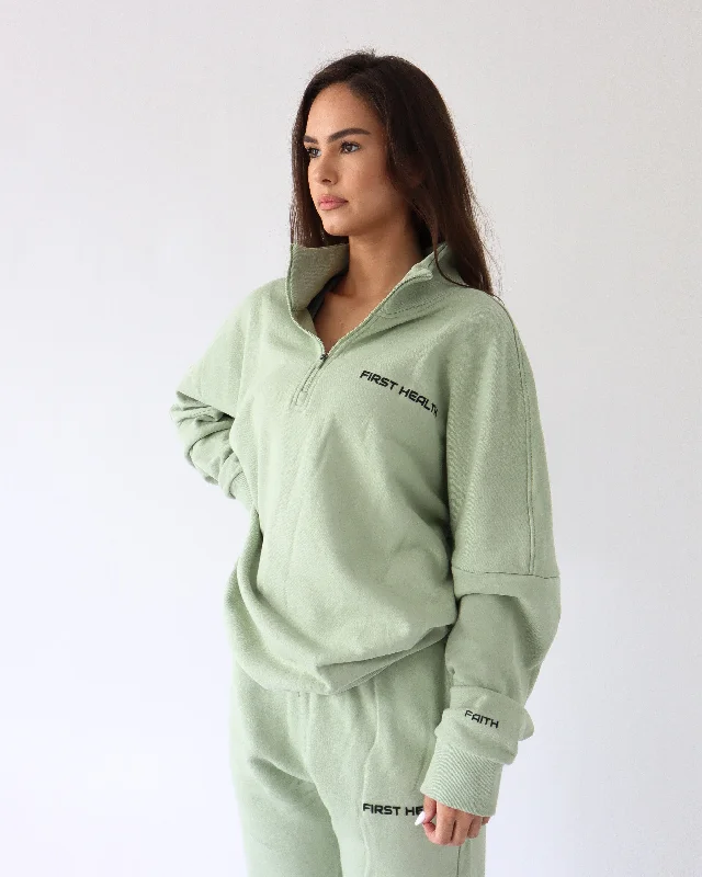 FAITH QUARTER ZIP - Pistachio