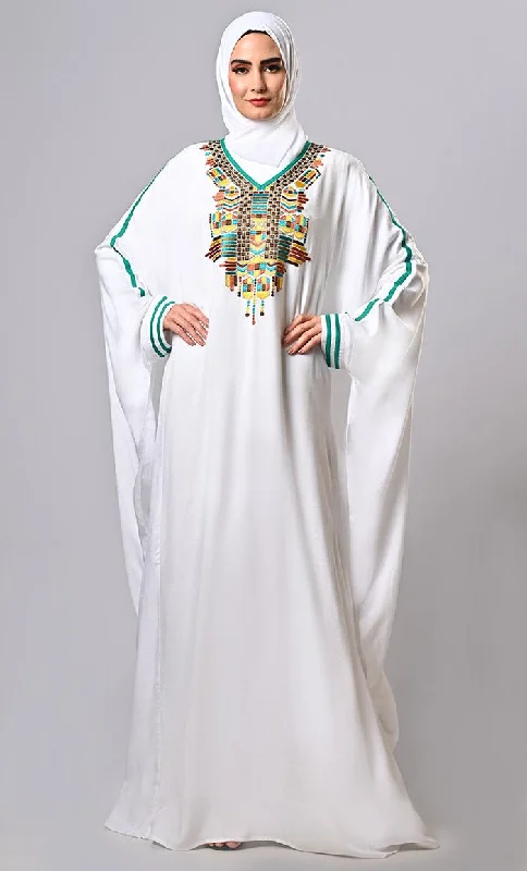 Pure Elegance: White Embroidered Abaya with Intricate Detailing