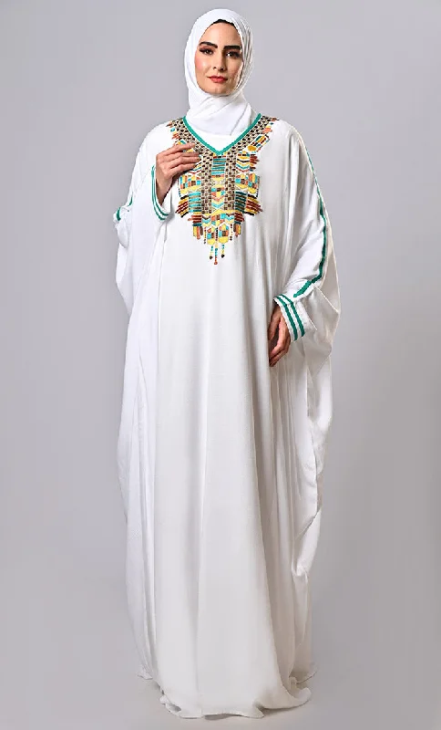 Pure Elegance: White Embroidered Abaya with Intricate Detailing